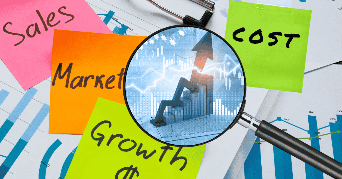a magnifying glass scrolls over pages of sales, marketing, and expense charts spattered with colorful sticky notes